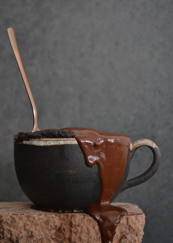 Chocolate mug cake with a chocolate drip